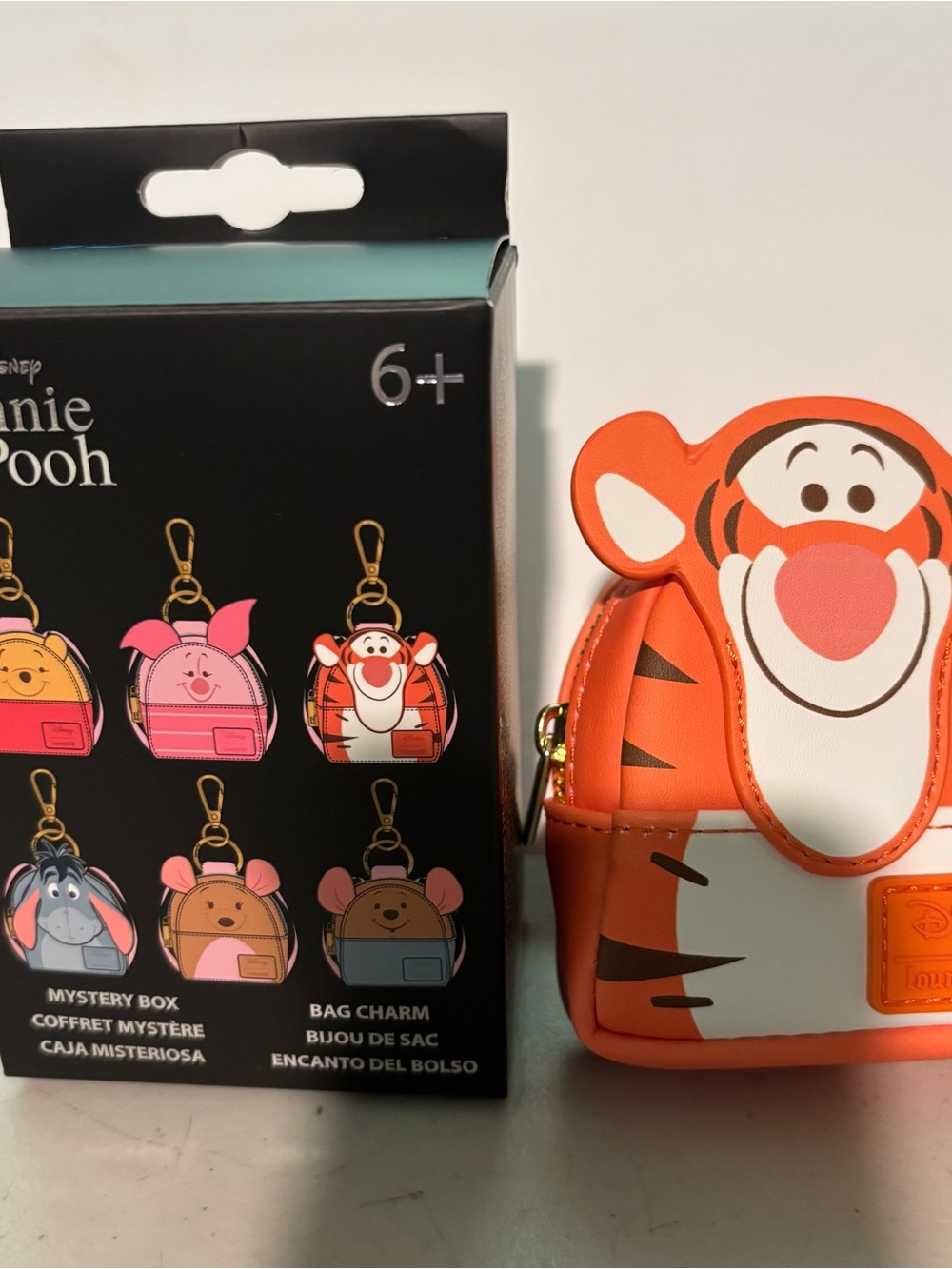 Loungfly from mystery box tigger bag-mini coin charm. New
